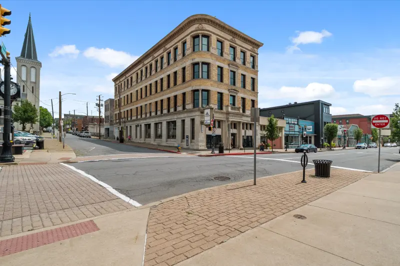 Historic brick commercial building at a downtown intersection in Northeastern Pennsylvania