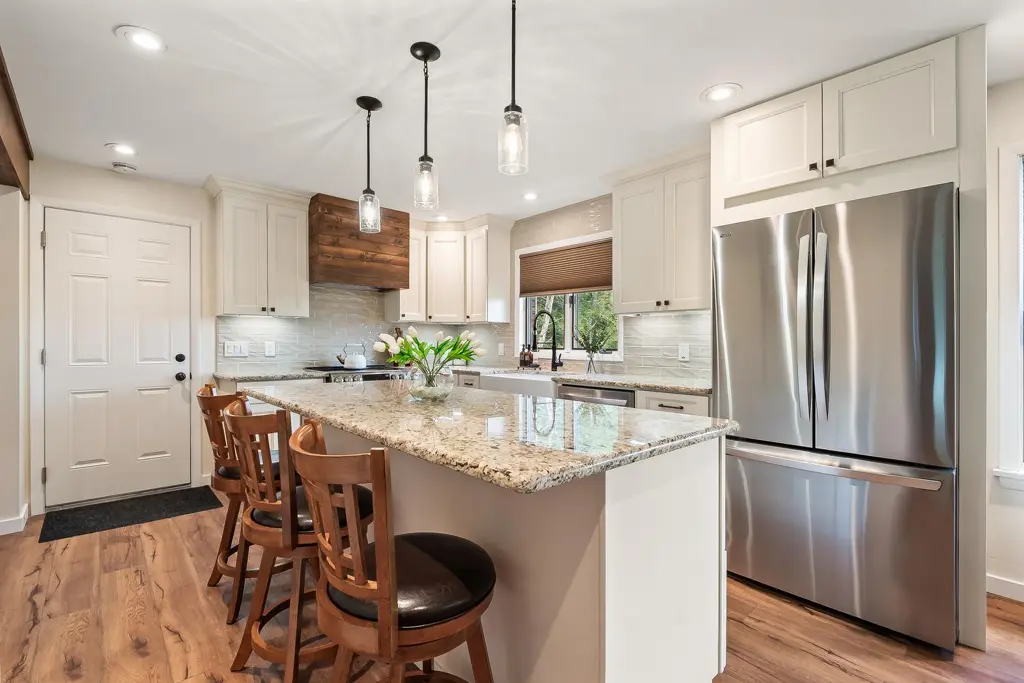 Renovated kitchen with an island and stainless appliances in a Northeastern Pennsylvania home