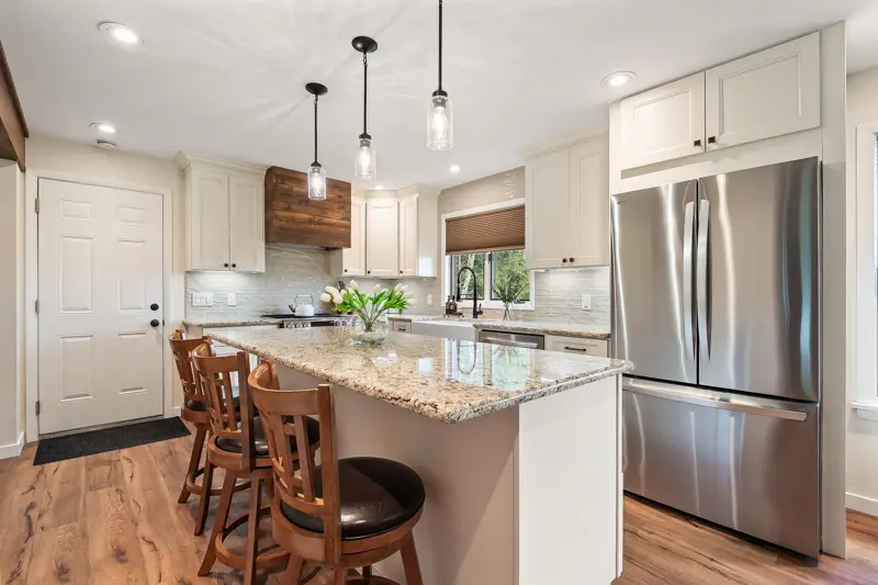 Renovated kitchen with an island and stainless appliances in a Northeastern Pennsylvania home
