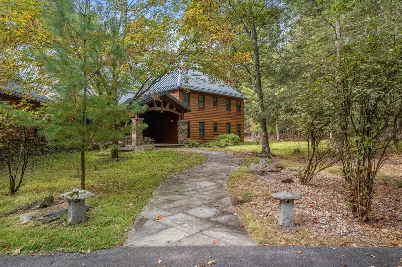 Wooded home with a stone path in Shavertown, Pennsylvania